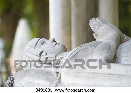Stock Photography - France, Paris 20th district. Pere Lachaise cemetery. Grave of Heloise and Abelard. The recumbent statue of Heloise of Argenteuil (1092-1164). Fotosearch