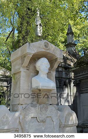 Stock Photography - France, Paris 20th district. Pere Lachaise cemetery. Grave of the poet Alfred de Musset (1810-1857), works of the sculptor Auguste Barre. Fotosearch