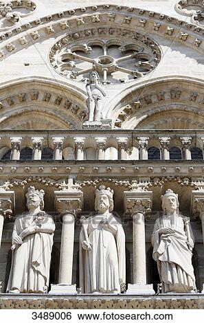 Stock Photograph - France, Paris. 4th arrondissement. Ile de la Cite. Sculpture on the facade of Notre Dame Cathedral.. Fotosearch