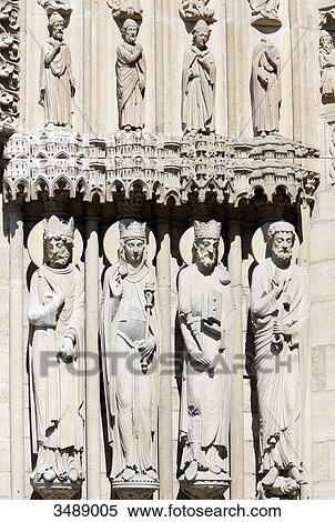 Stock Photography - France, Paris. 4th arrondissement. Ile de la Cite. Sculptures on the facade (gate) of Notre Dame Cathedral.. Fotosearch