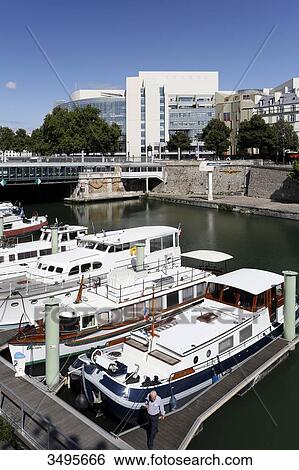 France, Paris, 4th arrondissement, Port de l'Arsenal. Architect: Carlos Ott. Permission required for advertisement purpose. View Large Photo Image Stock Photograph - France, Paris, 4th arrondissement, Port de l'Arsenal. Architect: Carlos Ott. Permission required for advertisement purpose.. Fotosearch