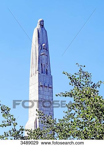 Stock Photo - France, Paris. 5th arrondissement. Tournelle Bridge. Sculpture at its top.. Fotosearch