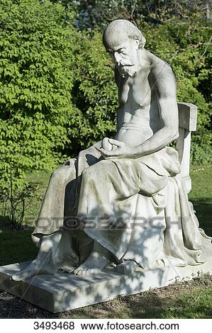 Stock Photo - France, Paris, 5th district. Jardin des plantes. The statue Science and mystery by Jean-Louis-Desire Schrder (1889); a philosopher wonders about the origin of life by meditating on an egg. Fotosearch