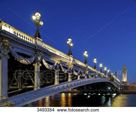 Picture - France, Paris, Alexandre III bridge at night. Fotosearch