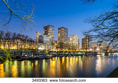 Stock Image - France, Paris, Beaugrenelle district, nighttime. Fotosearch