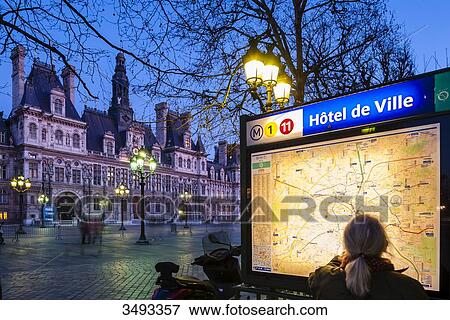 France, Paris, Metro station at night in the foreground, Hotel de ville (town hall) in the background. View Large Photo Image Stock Photo - France, Paris, Metro station at night in the foreground, Hotel de ville (town hall) in the background.. Fotosearch