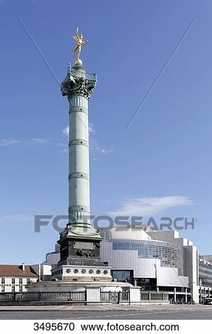 Stock Image - France, Paris, Place de la Bastille, July Column, Genie de la Liberte. Opera Bastille. Architect: Carlos Ott. Permission required for advertisement purpose.. Fotosearch