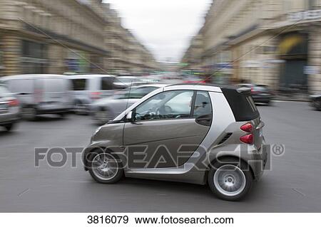 Stock Photo - France, Paris, Place de l'Opera, Smart.. Fotosearch