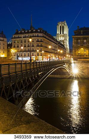Stock Photo - France, Paris, Pont d'Arcole at night. Fotosearch