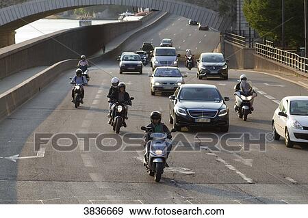 Stock Photo - France, Paris, Quai de la Rapee, traffic on the highway.. Fotosearch