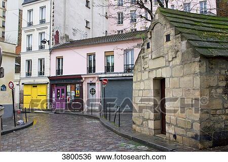 France, Paris, Rue des Cascades in the rain. View Large Photo Image Stock Photograph - France, Paris, Rue des Cascades in the rain.. Fotosearch