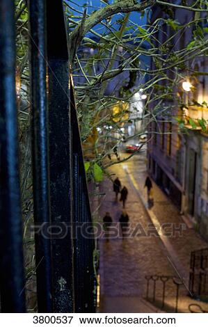 France, Paris, Rue Levert in the rain at dusk. View Large Photo Image Stock Photo - France, Paris, Rue Levert in the rain at dusk.. Fotosearch