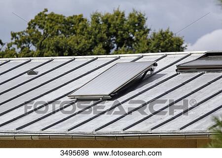 France, Paris. Vincennes. Bois de Vincennes. La Ferme de Paris. Organic agriculture and farming educational farm. Closeup of a thermal solar panel on the roof of a building. View Large Photo Image Stock Photo - France, Paris. Vincennes. Bois de Vincennes. La Ferme de Paris. Organic agriculture and farming educational farm. Closeup of a thermal solar panel on the roof of a building.. Fotosearch