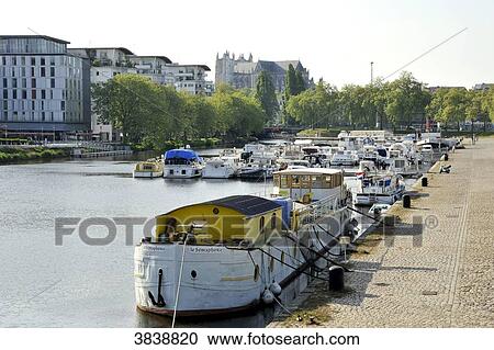 France, region of Pays de La Loire, Loire-Atlantique department, Nantes city, boats moored on canal of Saint-Felix, Cathedral of St. Peter and St. Paul in the back. View Large Photo Image Stock Image - France, region of Pays de La Loire, Loire-Atlantique department, Nantes city, boats moored on canal of Saint-Felix, Cathedral of St. Peter and St. Paul in the back.. Fotosearch