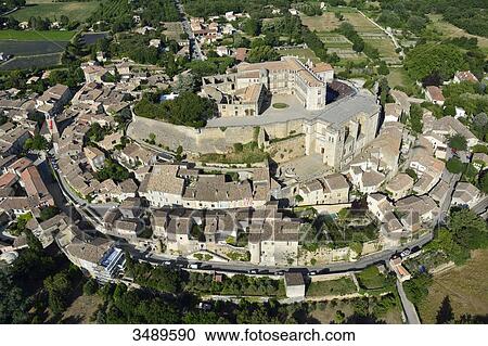 France, Rhone-Alpes, Drome, village of Grignan, dominated by the castle where the Marquise de Sevigne used to live, aerial view View Large Photo Image Stock Image - France, Rhone-Alpes, Drome, village of Grignan, dominated by the castle where the Marquise de Sevigne used to live, aerial view. Fotosearch