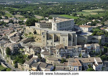 France, Rhone-Alpes, Drome, village of Grignan, dominated by the castle where the Marquise de Sevigne used to live, aerial view View Large Photo Image Stock Photo - France, Rhone-Alpes, Drome, village of Grignan, dominated by the castle where the Marquise de Sevigne used to live, aerial view. Fotosearch