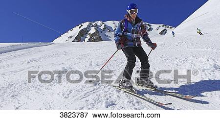 Stock Photo - France. Savoie. Winter sports, ski. Fotosearch
