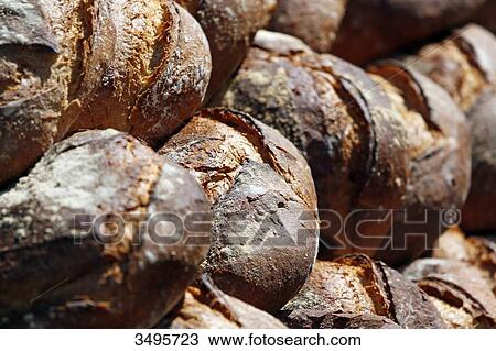 Stock Image - France, Seine et Marne. Crafts. Closeup of bread called farm ball.. Fotosearch