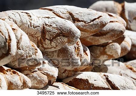 Stock Photography - France, Seine et Marne. Crafts. Focus on the bread of the mill.. Fotosearch