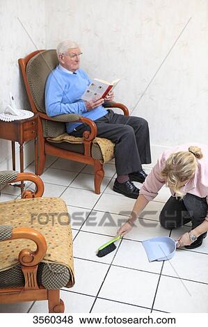 Stock Photo - France, senior and employee in residence. Fotosearch