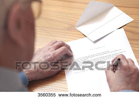 Stock Photography - France, senior writing its will. Fotosearch