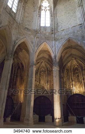 France, Southern France, Vileveyrac, Cistercian abbey of Holy Mary of Valmagne, 13th century, gothic style, nave turned into a wine storehouse after the Revolution View Large Photo Image Stock Image - France, Southern France, Vileveyrac, Cistercian abbey of Holy Mary of Valmagne, 13th century, gothic style, nave turned into a wine storehouse after the Revolution. Fotosearch
