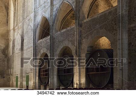France, Southern France, Vileveyrac, Cistercian abbey of Holy Mary of Valmagne, 13th century, gothic style, nave turned into a wine storehouse after the Revolution View Large Photo Image Stock Image - France, Southern France, Vileveyrac, Cistercian abbey of Holy Mary of Valmagne, 13th century, gothic style, nave turned into a wine storehouse after the Revolution. Fotosearch