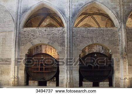 France, Southern France, Vileveyrac, Cistercian abbey of Holy Mary of Valmagne, 13th century, gothic style, nave turned into a wine storehouse after the Revolution View Large Photo Image Stock Photo - France, Southern France, Vileveyrac, Cistercian abbey of Holy Mary of Valmagne, 13th century, gothic style, nave turned into a wine storehouse after the Revolution. Fotosearch