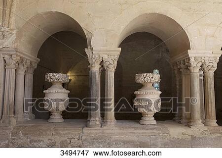 Stock Photo - France, Southern France, Vileveyrac, Cistercian abbey of Holy Mary of Valmagne, 13th century, gothic style, entrance of the chapter house. Fotosearch