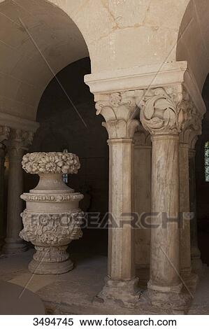 Stock Photography - France, Southern France, Vileveyrac, Cistercian abbey of Holy Mary of Valmagne, 13th century, gothic style, entrance of the chapter house. Fotosearch