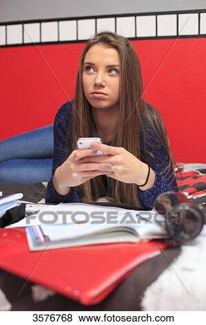 France, teenager at home in her bedroom View Large Photo Image Stock Photo - France, teenager at home in her bedroom. Fotosearch