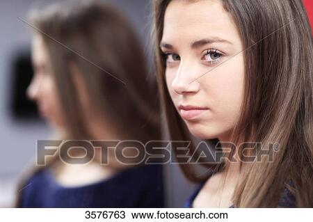 Stock Image - France, teenager at home. Fotosearch