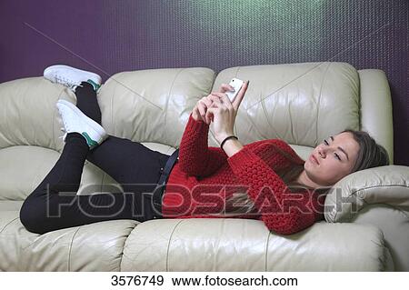 Stock Photo - France, teenager at home. Fotosearch