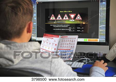 France, teenager being exerted with the highway code by Internet. View Large Photo Image Stock Image - France, teenager being exerted with the highway code by Internet.. Fotosearch