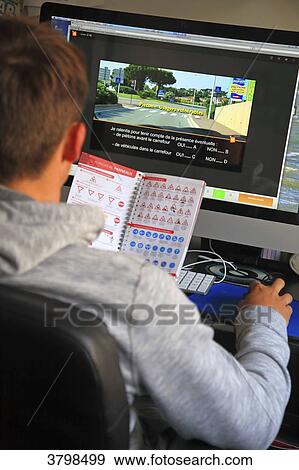 France, teenager being exerted with the highway code by Internet. View Large Photo Image Stock Photo - France, teenager being exerted with the highway code by Internet.. Fotosearch