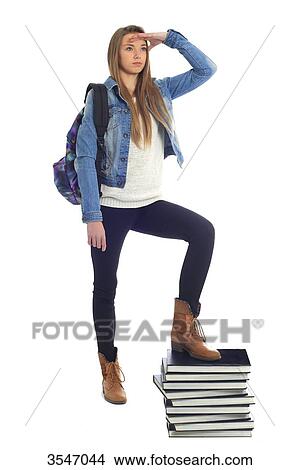 France, teenager in studio on books View Large Photo Image Picture - France, teenager in studio on books. Fotosearch