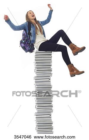 France, teenager in studio on books View Large Photo Image Stock Photograph - France, teenager in studio on books. Fotosearch