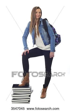 France, teenager in studio on books View Large Photo Image Stock Photography - France, teenager in studio on books. Fotosearch
