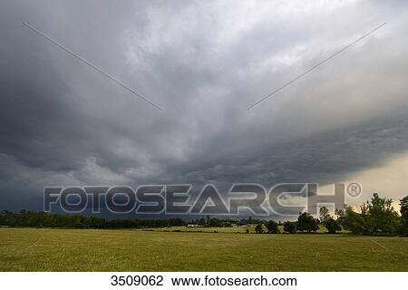 France, Vendee countryside under a storm cloud View Large Photo Image Stock Image - France, Vendee countryside under a storm cloud. Fotosearch