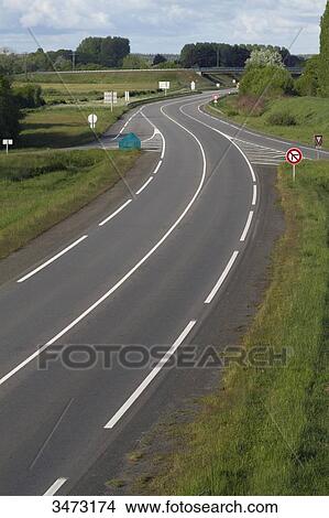 Picture - France, Western France, Arthon-en-Retz, traffic on D 751 road. Fotosearch