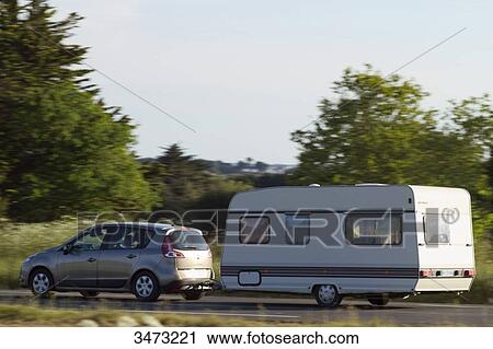Stock Image - France, Western France, Les Moutiers-en-Retz, traffic on D13 road (the blue road). Fotosearch