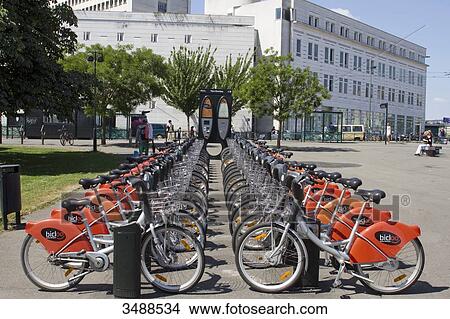 Picture - France, Western France, Nantes, Place Alexis Ricordeau, bike sharing station. Fotosearch