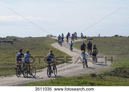 France, Western France, Yeu island, tourists riding bikes in the natural site of the northwestern part of the island. View Large Photo Image Stock Photography - France, Western France, Yeu island, tourists riding bikes in the natural site of the northwestern part of the island.. Fotosearch