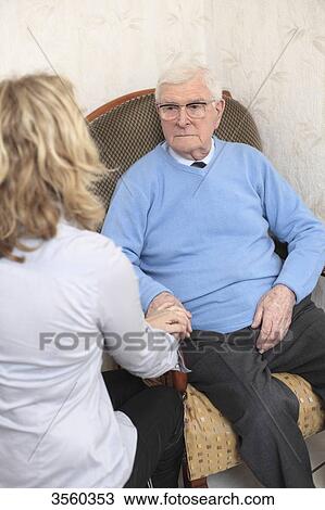France, woman comforting elderly View Large Photo Image Stock Image - France, woman comforting elderly. Fotosearch