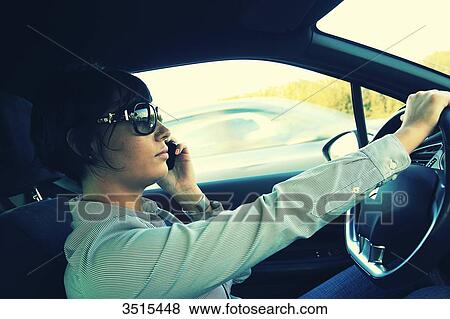 France, woman in car with phone View Large Photo Image Stock Photo - France, woman in car with phone. Fotosearch