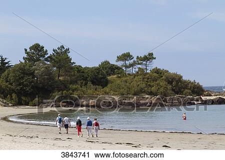 France, You Island, seniors walking on the plage des Sapins. View Large Photo Image Stock Image - France, You Island, seniors walking on the plage des Sapins.. Fotosearch