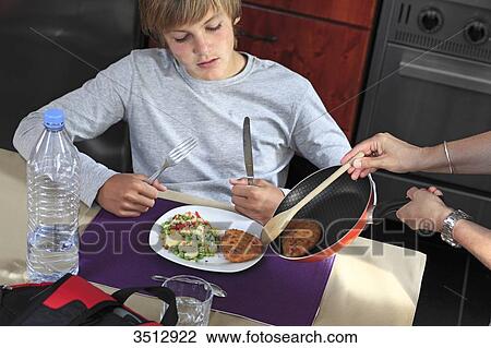 France, young boy eating View Large Photo Image Stock Image - France, young boy eating. Fotosearch
