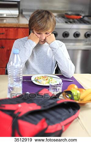 France, young boy eating View Large Photo Image Stock Photo - France, young boy eating. Fotosearch