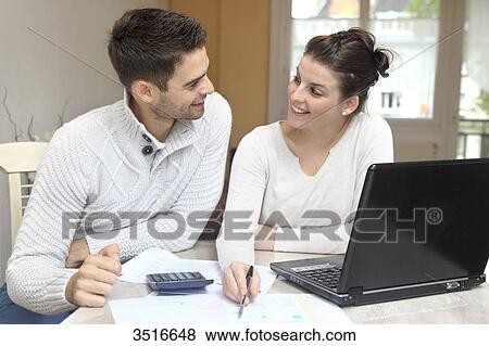 France, young couple at home View Large Photo Image Stock Photo - France, young couple at home. Fotosearch