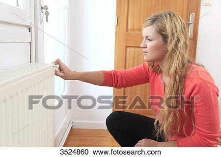 France, young woman and heating View Large Photo Image Stock Image - France, young woman and heating. Fotosearch